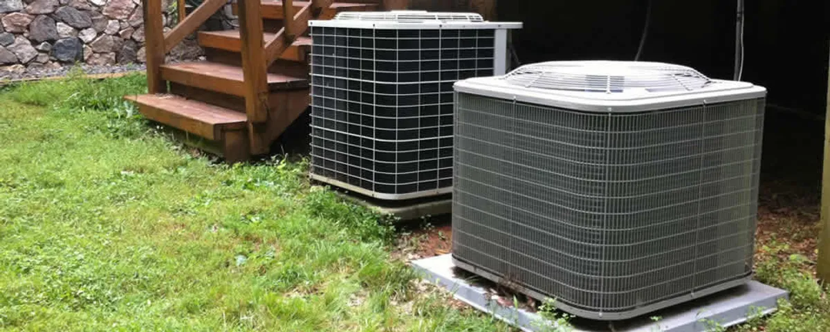 Heat pump installation and service units outside a home in Beverly, MA